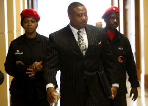 Why won't Quanell X wear the uniform of the group he supposedly leads???