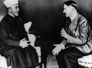 The leader of the Muslim Brotherhood, Amin Haj al Husseini, meets with Adolf Hilter.